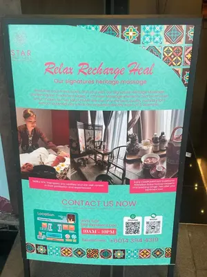 a sign for a redlash exchange healarmaarmaarmaarmaarmaarmaarmaarma at STAR Residence KLCC City Centre in Kuala Lumpur