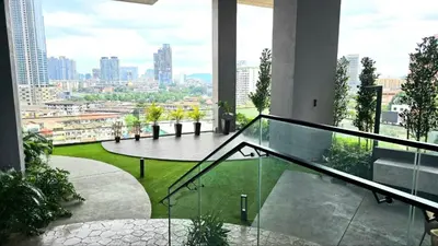 a balcony in a building with a view of a city at Cozy Axon Residence Bukit Bintang by Konoha Suites 1-6pax in Kuala Lumpur
