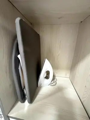 a small bathroom with a toilet in a wall at Simple Arte Mont Kiara 2 , MITEC Matrade Publika in Kuala Lumpur