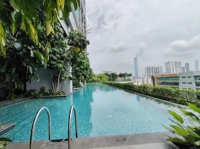 a large swimming pool on the side of a building at Trion Kuala Lumpur Superior room nearby mrt in Kuala Lumpur