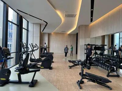 a gym with treadmills and exercise equipment in a building at Cozy Axon Residence Bukit Bintang by Konoha Suites 1-3pax in Kuala Lumpur