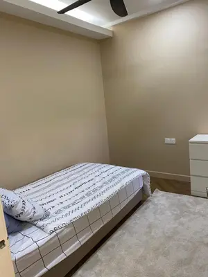 a bedroom with a bed in a room at Best Spot in City in Kuala Lumpur