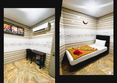 a room with a bed and a desk in it at ARK Wave Hotel Ampang in Ampang
