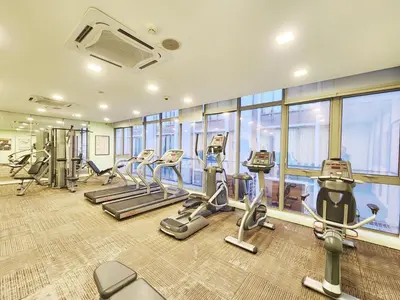 a gym with treadmills and ellipticals in a building at Bukit Bintang Fairlane 1412 for 1-5pax 1BR TRX Pavilion KL in Kuala Lumpur
