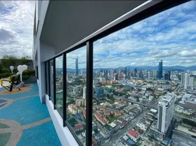 a room with a view of a city at Trion Kuala Lumpur KLCC view L65 2br 2bth in Kuala Lumpur