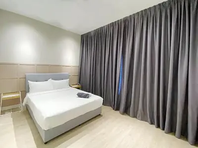 a bedroom with a white bed and a large window at Arte plus by dream stay in Kuala Lumpur