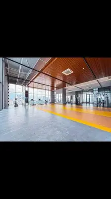 a large building with a large room with windows at Cozy kenwingston platz kl 2-5pax 2BR&2BR Klcc view pakin netflx 3705A in Kuala Lumpur