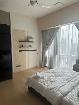 a bedroom with a bed and a large window at Cozy Comfy & Affordable Place at KLCC in Kuala Lumpur