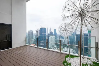a balcony with a view of a city skyline at Maxhome-Agile Bukit Bintang TRX in Kuala Lumpur