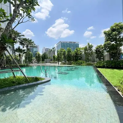 a swimming pool in a park with trees and buildings at Maxhome-Agile Bukit Bintang TRX in Kuala Lumpur