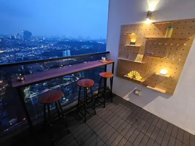 a bar on the top of a building with a view at SkyView Studio, EST Bangsar, High View for 2 in Kuala Lumpur