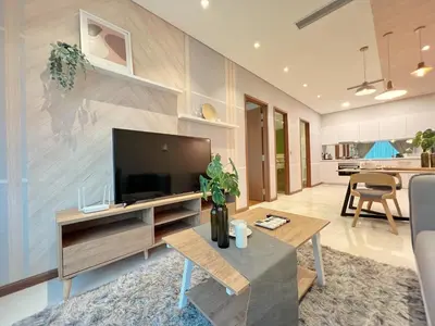 a living room with a large flat screen tv at Sky Suites Centrale 3BR Suite at KLCC in Kuala Lumpur