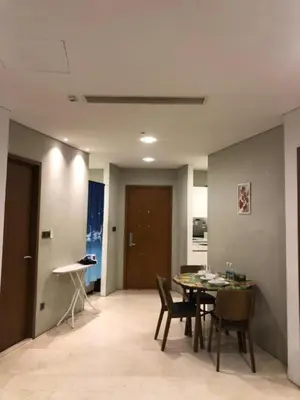 a dining room with a table and chairs at KL Suites Apartment at Vortex in Kuala Lumpur