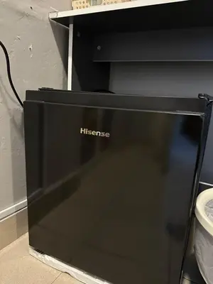 a black hitech computer monitor sitting on the floor at SS Grey Hotel Bukit Bintang in Kuala Lumpur