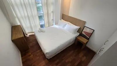 a small bedroom with a bed with a teddy bear on it at Bintang Goldhill Near TRX & Pavilion Mall,MRT,KL By Proplet in Kuala Lumpur
