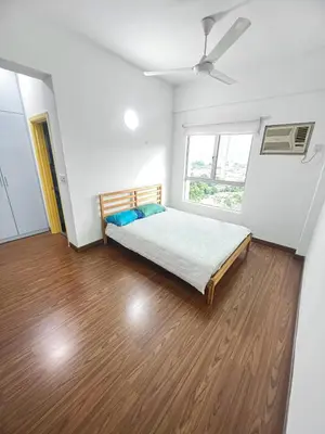 a bedroom with a bed and a large window at Superior Seri Maya Kuala Lumpur in Kuala Lumpur