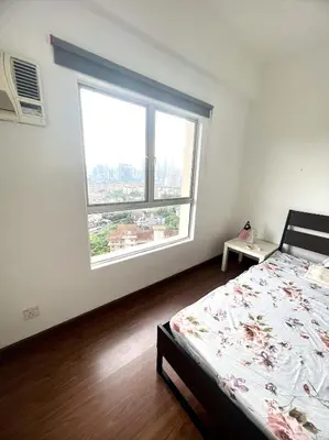 a bedroom with a bed and a large window at Superior Seri Maya Kuala Lumpur in Kuala Lumpur