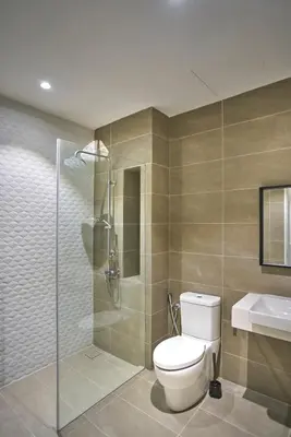 a bathroom with a toilet and a shower and a sink at Quill Residence Luxury Suite Kuala Lumpur by Cobnb in Kuala Lumpur