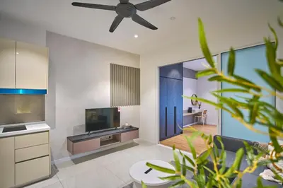 a large living room with a ceiling fan at Quill Residence Luxury Suite Kuala Lumpur by Cobnb in Kuala Lumpur