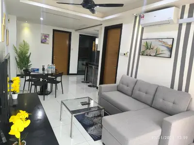 a living room with a couch and a table at 018-6 Sweet Home-Casa Residency 2R 2B in Kuala Lumpur