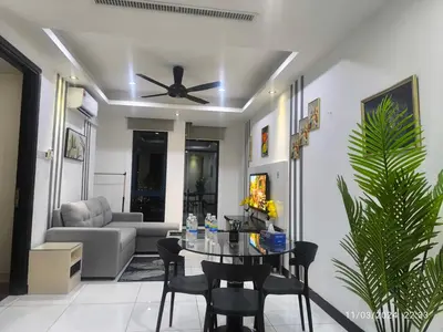 a living room with a ceiling fan and a table and chairs at 018-6 Sweet Home-Casa Residency 2R 2B in Kuala Lumpur