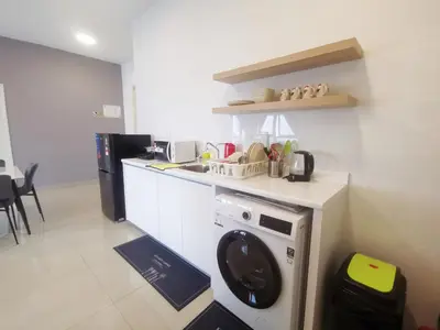 a kitchen with a dishwasher and a counter top at Arte Plus by Manhattan Group in Kuala Lumpur