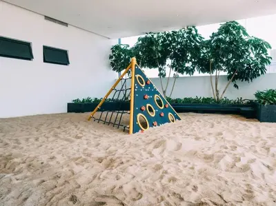 a playground in the sand in a building at 8 Pax Continew 2R2B Premium Amenities 10mins to KLCC TRX in Kuala Lumpur