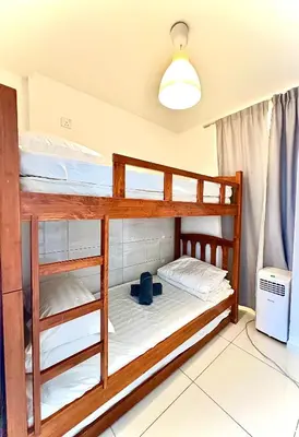 a bedroom with two bunk beds in a room at Home Sweet Home at Robertson Bukit Bintang,TRX,KLCC in Kuala Lumpur