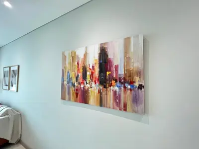 a painting of a city on a wall at Sky Suites Charming 3BR Suite KLCC View in Kuala Lumpur