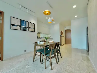 a kitchen and dining room with a table and chairs at Sky Suites Wonder 2BR Suite KLCC View in Kuala Lumpur