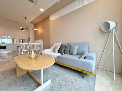a living room with a couch and a table at Sky Suites Upper 3BR Suite at KLCC in Kuala Lumpur