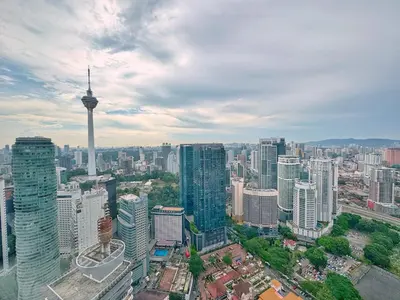 an aerial view of a city with skyscrapers at Sky Suites Upper 3BR Suite at KLCC in Kuala Lumpur