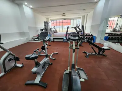 a gym with several treadmills and exercise bikes at Désir Amorous KL #Jacuzzi #NFLX #Prjscn120