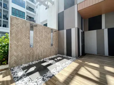 a lobby of a building with a walkway at The colony by infinitum sweet home in Kuala Lumpur