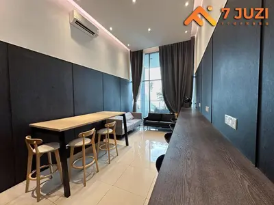 a dining room with a table and some chairs at Premium&Cozy Studio small cinema KLCC InfinityPool in Kuala Lumpur