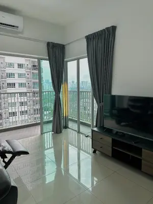 a living room with a television and large windows at Razak City Residences in Kuala Lumpur