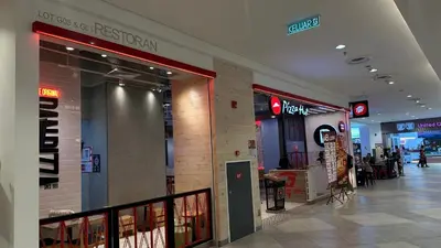a shopping mall with many stores and people in it at Datum Jelatek Superb Suite KL By LH in Kuala Lumpur