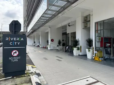 a building with a no right turn sign in front of it at KL Sentral Monorail Infinity Sky Pool Family Suites -The RIV in Kuala Lumpur