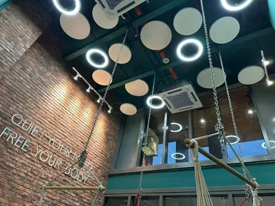a room with a bunch of lights on the ceiling at KL Sentral Monorail Infinity Sky Pool Family Suites -The RIV in Kuala Lumpur