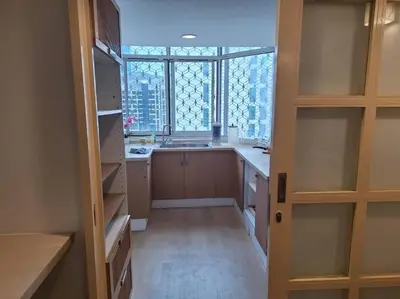 a kitchen with a sink and a window in it at Fahrenheit, Stay in the Heart of KL, 15 pax in Kuala Lumpur