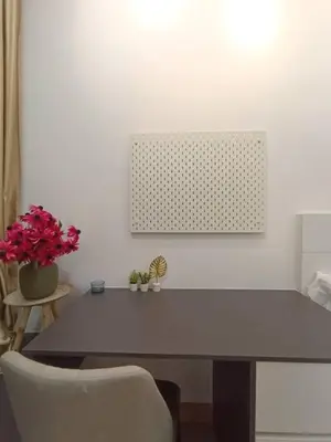 a table and a chair in a room at COL 108B Modern KLCC Balcony View & Infinity Pool in Kuala Lumpur