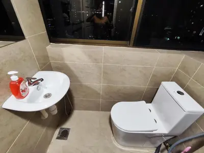 a bathroom with a toilet and a sink at Newly Reno Wisma Cosway Pavilion KLCC Bukit Bintang in Kuala Lumpur
