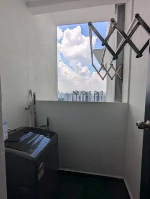 a window in a room with a view of a city at Reizz Residence Majesty Suite in Kuala Lumpur