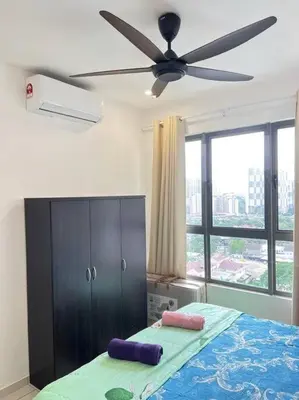 a bedroom with a ceiling fan and a bed at Cozy Kenwingston Platz KL 2-5 Pax2BR&2BR Pakin Netflix 1306 in Kuala Lumpur