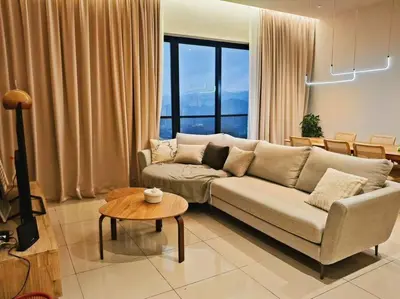 a living room with a couch and a table at 4B3R Lux Penthouse Astoria Ampang in Kuala Lumpur