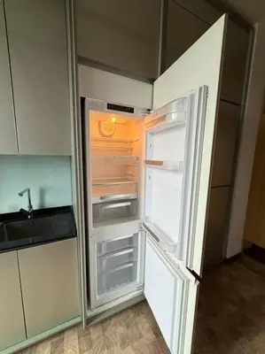 an empty refrigerator with its door open in a kitchen at Expressionz Professional Suites Studio in Kuala Lumpur