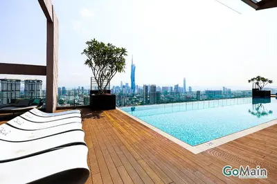 a swimming pool on the roof of a building at Skypool with KLCC View - KL Sentral Riveria City Suite Near KL City Centre KLCC in Kuala Lumpur