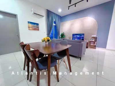 a dining room with a table and a couch at Kuala Lumpur, KLCC View, Titiwangsa, Tr Resident,Near MRT Station, 3BR 2BH by Atlantis Management in Kuala Lumpur