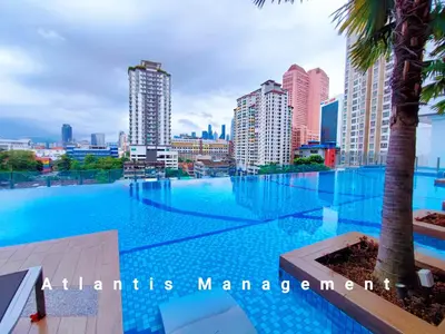 a large swimming pool in the middle of a city at Kuala Lumpur, KLCC View, Titiwangsa, Tr Resident,Near MRT Station, 3BR 2BH by Atlantis Management in Kuala Lumpur