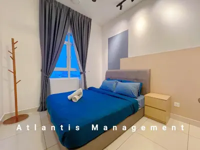 a bedroom with a blue bed and a window at TR Residence Block A,Titiwangsa in Kuala Lumpur